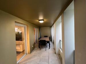 Appartements T2 moderne avec terrasse, proche de Lyon : photos des chambres