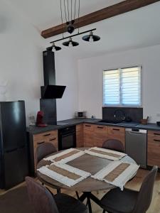 Appartements cottage LES SENS CIEL : photos des chambres