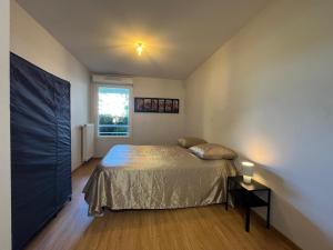 Appartements T2 cosy et renove avec terrasse - proche de Lyon : photos des chambres