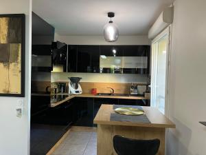 Appartements T2 cosy et renove avec terrasse - proche de Lyon : photos des chambres