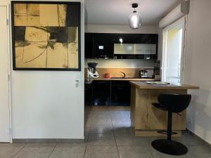 Appartements T2 cosy et renove avec terrasse - proche de Lyon : photos des chambres