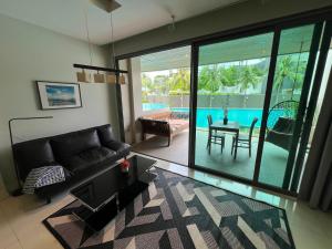 Beachfront Luxe with Pool Access and Terrace