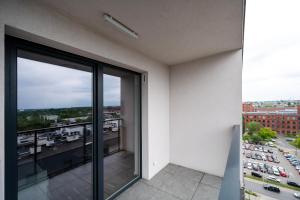 Manufaktura Comfort Apartment by BookingHost