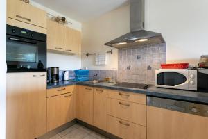 Appartements T2 avec terrasse proche plages : photos des chambres