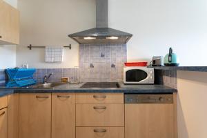 Appartements T2 avec terrasse proche plages : photos des chambres