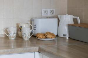 Family Apartment with Parking in Pruszków by Noclegi Renters