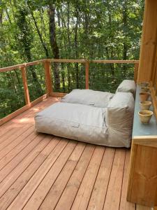 Maisons de vacances La cabane dans les arbres : photos des chambres
