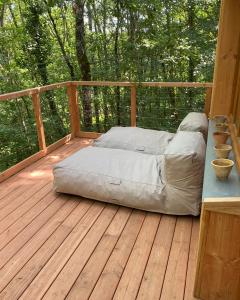 Maisons de vacances La cabane dans les arbres : photos des chambres
