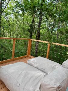 Maisons de vacances La cabane dans les arbres : photos des chambres