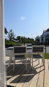 Maisons de vacances Maison neuve avec jardin : photos des chambres