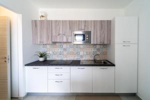 GuestHost - Borgo 84 Marzamemi - Oasi Smeralda