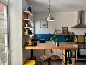 Maisons de vacances Maison familiale en centre-ville : photos des chambres