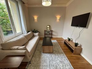 Grand T3 90m2 Haussmanien avec suite en centre ville et parking TOUT inclus