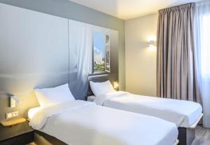 Hotels B&B HOTEL Orange : Chambre Lits Jumeaux