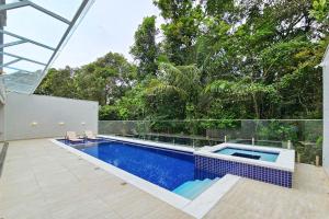 Casa de 400m² e piscina próximo à praia