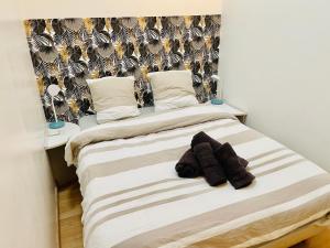 Appartements Le Noeud de Bois : photos des chambres