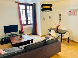 Appartements Le Noeud de Bois : photos des chambres