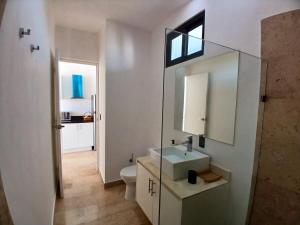 Mar Azul y Amanecer Desde la Cama