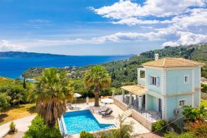 Villa Ioanna Agios Stephanos - 4hvězdičkové hotely ve městě Ágios Stéfanos