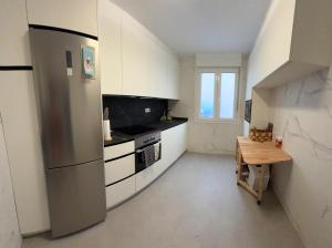 Habitación cerca del centro, baño y cocina compartida