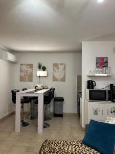 T2 RDC à Canet en Roussillon Europa 4 pers ,piscine,clim, tennis, parking