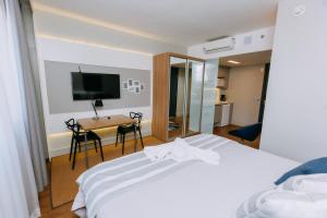 Studio Aconchegante no Batel Cama King WiFi e Estac