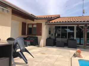 Maisons de vacances Villa lumineuse, logement et jardin et piscine privatifs, TV connectee : photos des chambres