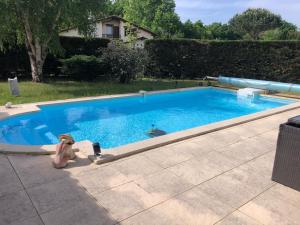 Maisons de vacances Villa lumineuse, logement et jardin et piscine privatifs, TV connectee : photos des chambres