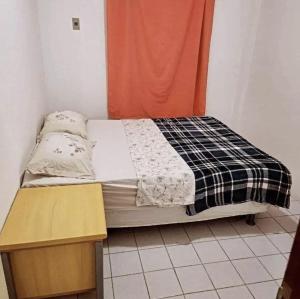 Quarto em apartamento