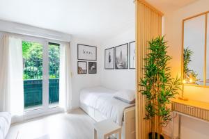 Appartements Le Carre CDG Studio Elegant : photos des chambres