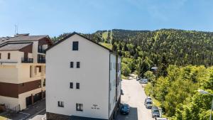 Appartements Aux pieds des pistes - Appt A : photos des chambres