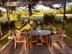 Sejours a la campagne Roulotte La Chouette des Granges : photos des chambres