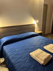 Dreibettzimmer mit Balkon