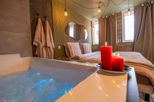 Appartements Ecrin des Alpes, Jacuzzi, Netflix, Ambiance chalet : photos des chambres
