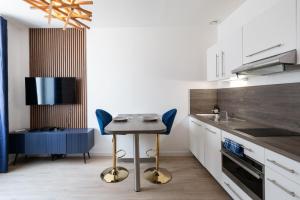 Appartements Le Hirvi - cocon zen et epure a 10min Vieux Lyon : photos des chambres