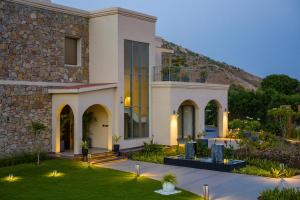 Stunning Mediterranean Style 3 BHK Villa With Outdoor Bar, Pool and Garden
