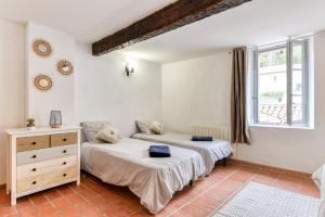 Maisons de vacances Au Pied de la Cite - Terrasse - Climatisation - Wifi : photos des chambres
