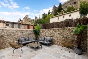 Maisons de vacances Au Pied de la Cite - Terrasse - Climatisation - Wifi : photos des chambres