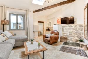 Maisons de vacances Au Pied de la Cite - Terrasse - Climatisation - Wifi : photos des chambres