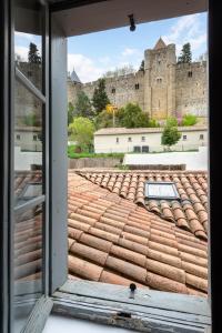 Maisons de vacances Au Pied de la Cite - Terrasse - Climatisation - Wifi : photos des chambres