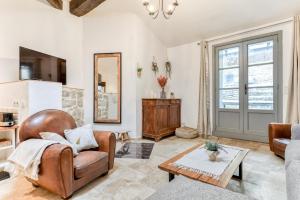 Maisons de vacances Au Pied de la Cite - Terrasse - Climatisation - Wifi : photos des chambres
