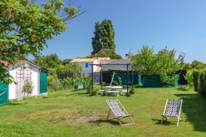 Maisons de vacances Maison Familiale a Grand Village : photos des chambres