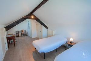 Maisons de vacances Le Damier - Maison de Campagne - 3 chambres -130m2 : photos des chambres