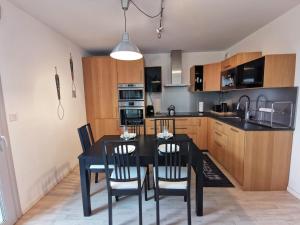 Appartements Logement climatise proche Atlantis et Zenith - Marcel : photos des chambres