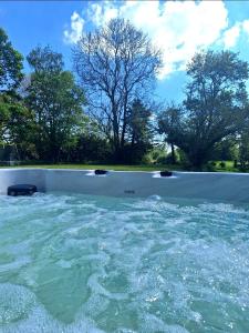Maisons de vacances Longere avec jacuzzi et jardin a 10 min de Rennes : photos des chambres