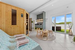 Villa Spa Otium for 8 people with 32 m2 heated pool, outdoor cinema, kids playground & spa area