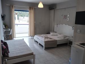 blue & white askeli studios - 3hvězdičkové hotely ve městě Poros