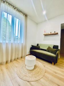 Appartements Appartement cosy avec jardin : photos des chambres