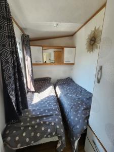 Chalets MOBILHOME camping LA FALAISE : photos des chambres