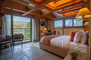 ELIVAAS Blushing Pines 3 BHK With Indoor Pool, Attic and Classy Interiors